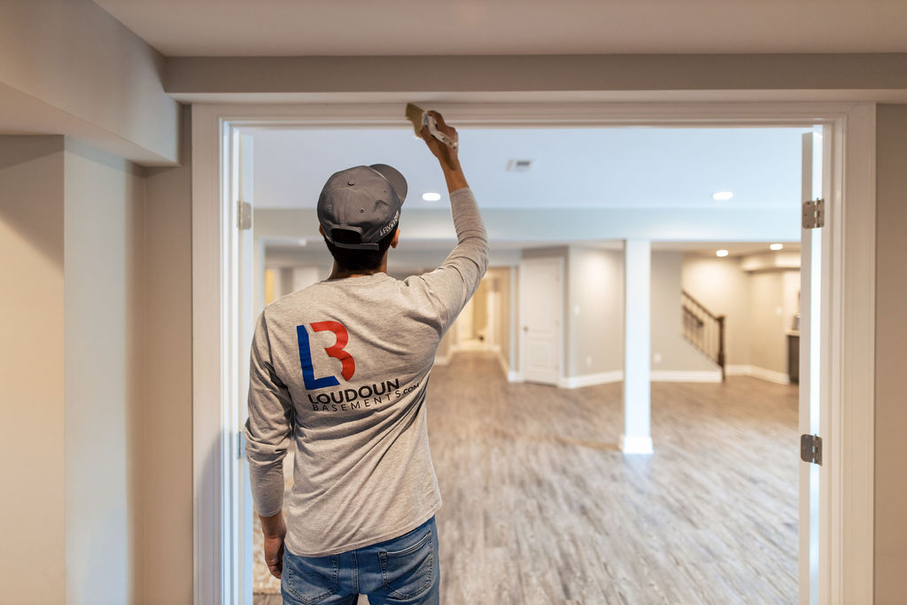 Image of Loudoun Basements member finishing carpentry in remodeled basement